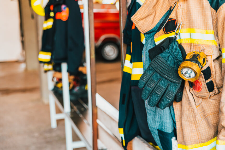 firefighter gloves and jacket dry after being cleaned